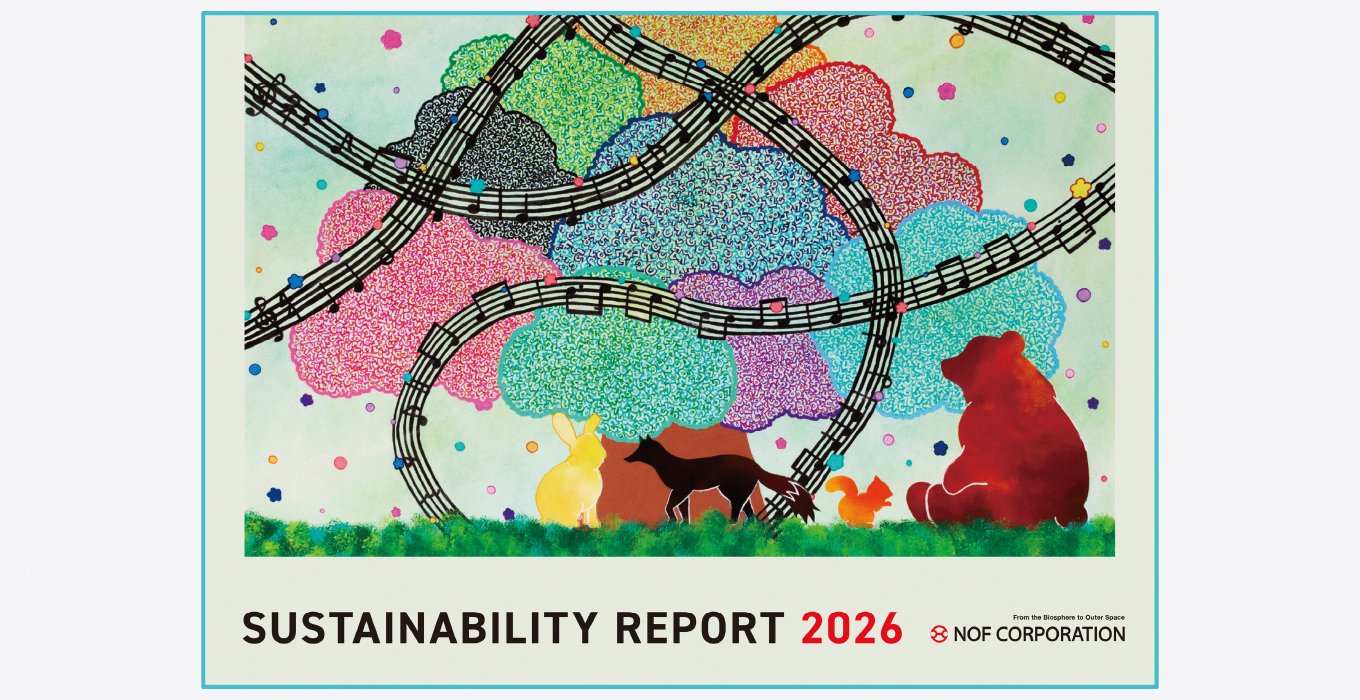 This is the cover of NOF Corporation’s Sustainability Report 2026. It prominently features an illustration filled with motifs that evoke a sense of vitality, including a tree rendered in a diverse palette of green, pink, and blue; a curved musical staff suggesting the flow of music; and the silhouettes of animals gathering at the base of the tree. The title 