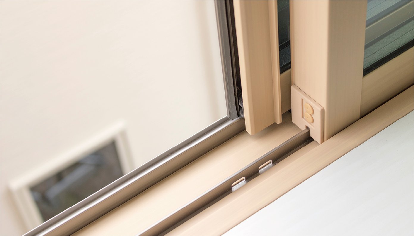 This is a close-up shot of the rail part of the window frame made of resin.